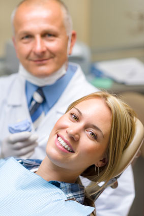 patient and dentist smiling